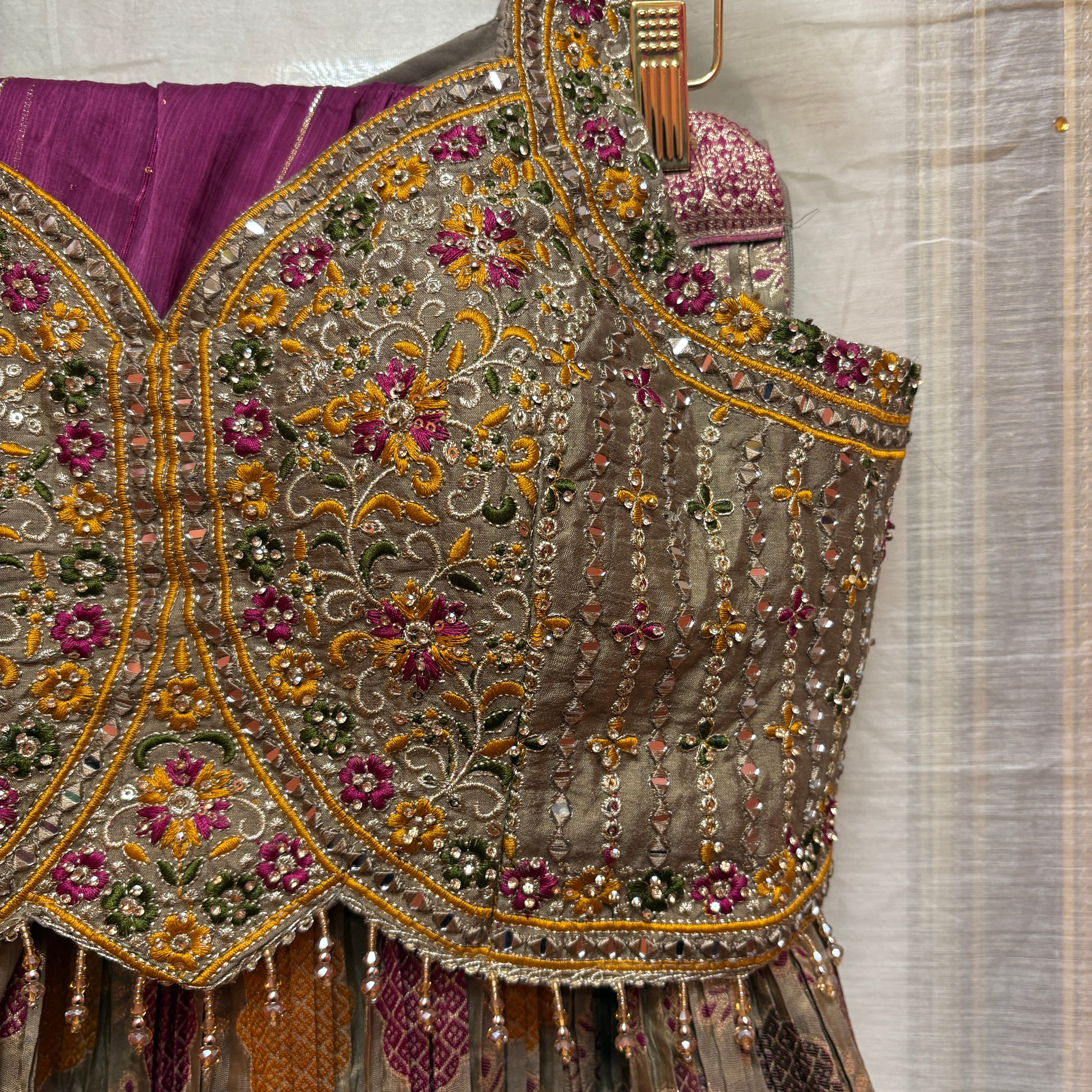 Gold W Muted Colors Lehenga Set